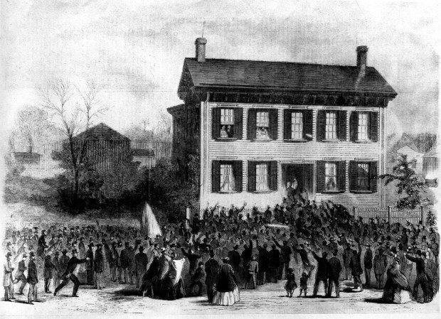 Supporters gather at the home of U.S. president-elect Abraham Lincoln in Springfield, on the morning of Nov. 7, 1860. Lincoln and his wife are shown in the drawing in the upper left window of their home. (AP)