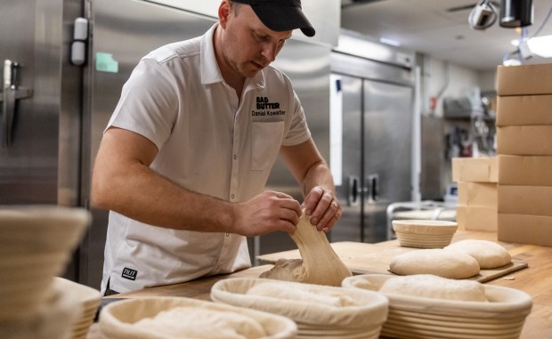 Owner Dan Koester shapes the dough for the country sourdough bread for the next day's preorders on Nov. 22, 2025, at Bad Butter in The Emily Hotel in Chicago's West Loop neighborhood. (Dominic Di Palermo/Chicago Tribune)