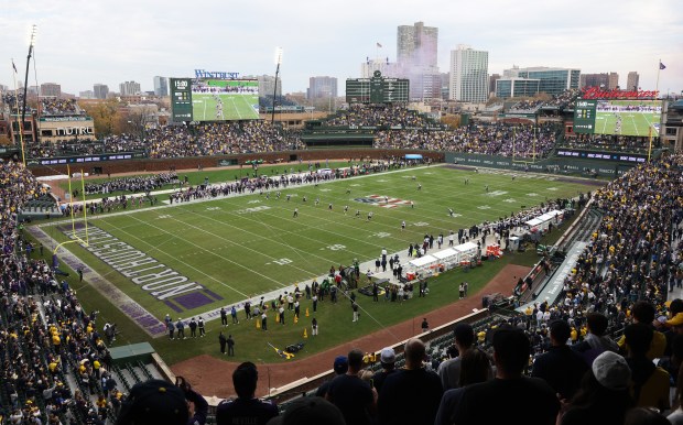 Kickoff ensues for a Northwestern-Michigan game at Wrigley Field on Nov. 15, 2025, in Chicago. (John J. Kim/Chicago Tribune)