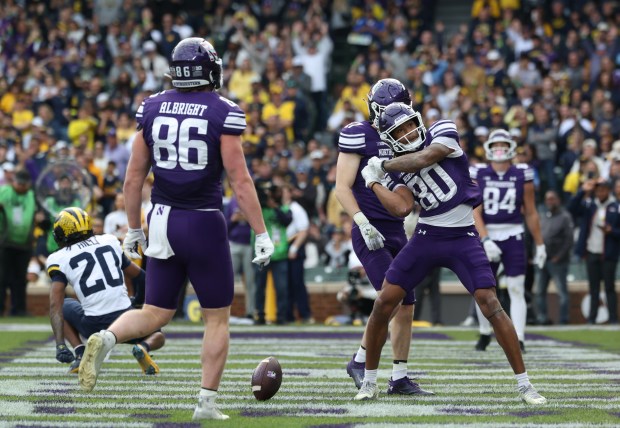 Northwestern wide receiver Hayden Eligon II (80) celebrates after a touchdown reception, which was overturned because of a penalty, in the second quarter against Michigan at Wrigley Field on Nov. 15, 2025, in Chicago. (John J. Kim/Chicago Tribune)