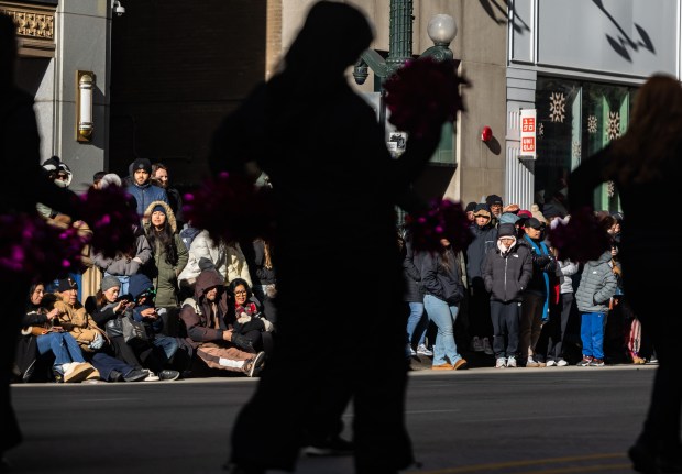 Spectators watch DivaDance performers dance during the 91st annual Chicago Thanksgiving Parade on Nov. 27, 2025. (Dominic Di Palermo/Chicago Tribune)