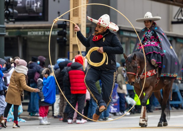 A lasso dancer performs during the 91st annual Chicago Thanksgiving Parade on Nov. 27, 2025. (Dominic Di Palermo/Chicago Tribune)