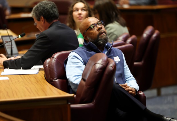 Ald. Desmon Yancy, 5th, watches a monitor during a Public Safety Committee meeting at City Hall, Sept. 9, 2024. (Eileen T. Meslar/Chicago Tribune)