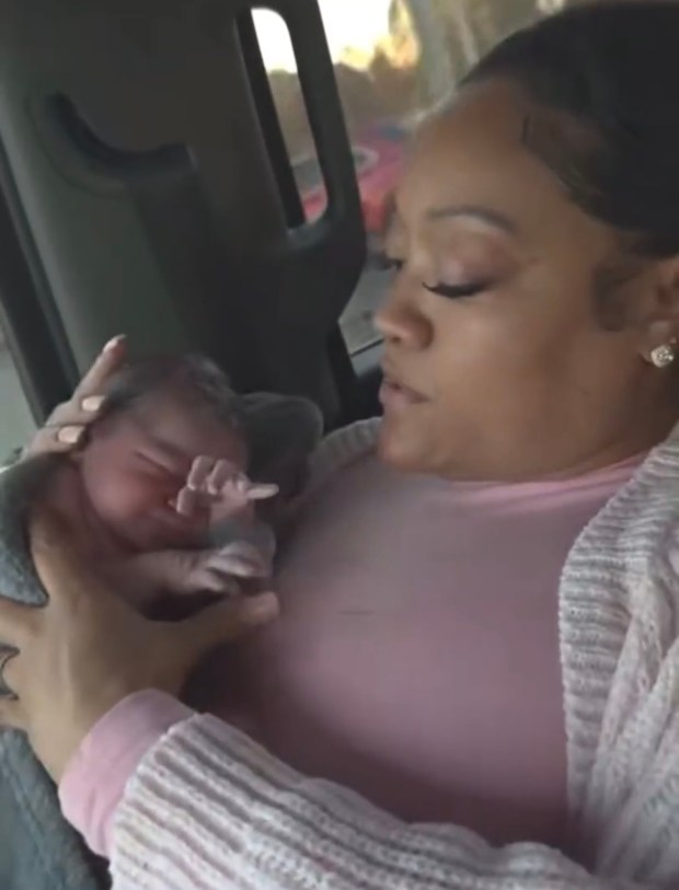 Dolton, Illinois resident Mercedes Wells was discharged from Franciscan Health Crown Point hospital early Sunday morning because nurses told her that labor wasn't progressing and she was only dilated 3 cm, according to the family. They were driving to Munster's Community Hospital about eight minutes later when they had to pull over the car where Mercedes delivered a healthy baby girl. (Wells Family)