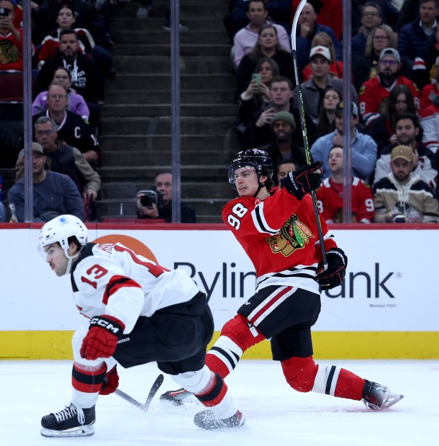 Blackhawks center Connor Bedard shoots the puck in the first period against the Devils on Wednesday, Nov. 12, 2025, at the United Center. (Chris Sweda/Chicago Tribune)