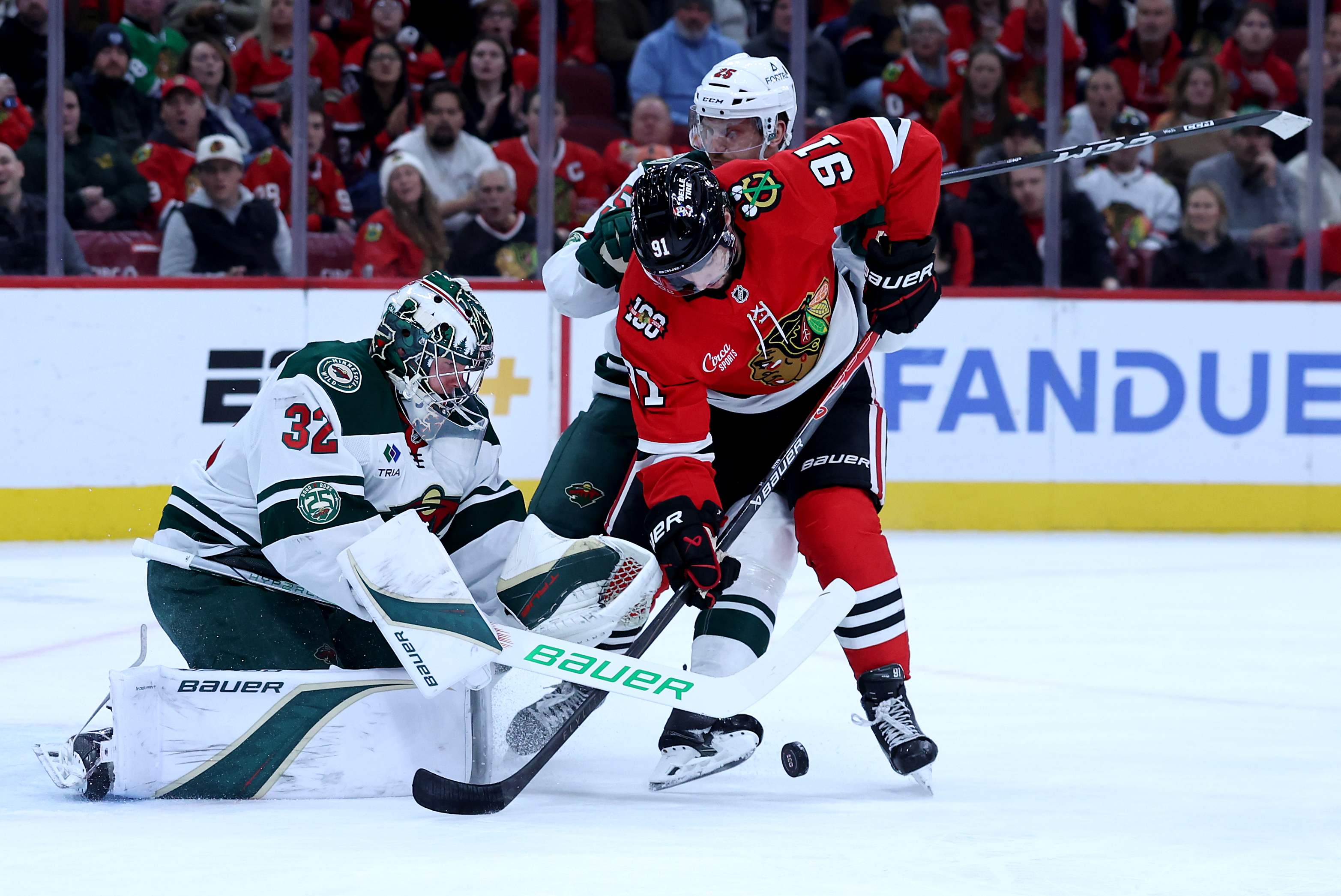 Chicago Blackhawks center Frank Nazar (91) is unable to score on Minnesota Wild goaltender Filip Gustavsson (32) in the first period of a game at the United Center in Chicago on Nov. 26, 2025. (Chris Sweda/Chicago Tribune)