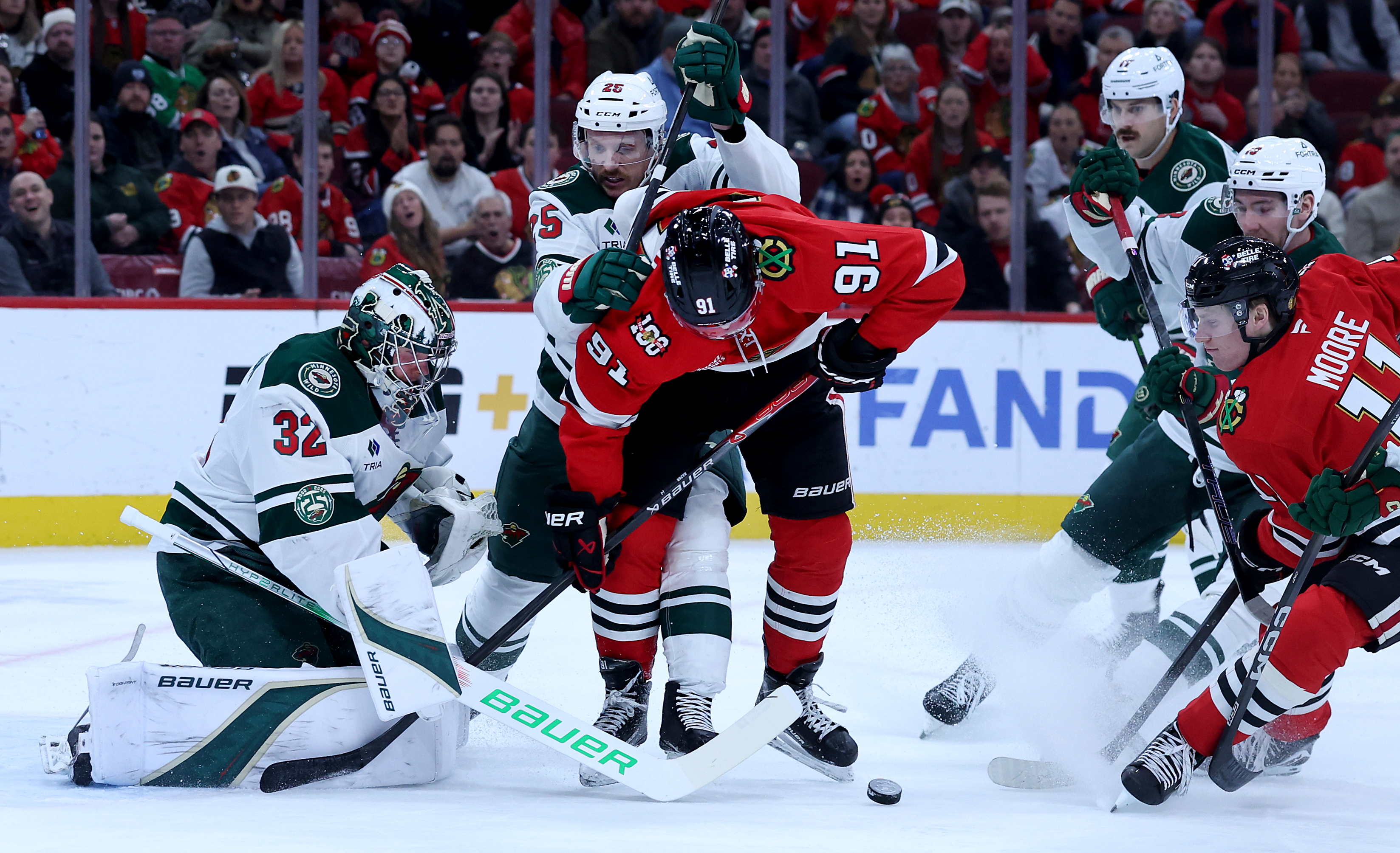 Chicago Blackhawks center Frank Nazar (91) is unable to score on Minnesota Wild goaltender Filip Gustavsson (32) in the first period of a game at the United Center in Chicago on Nov. 26, 2025. (Chris Sweda/Chicago Tribune)