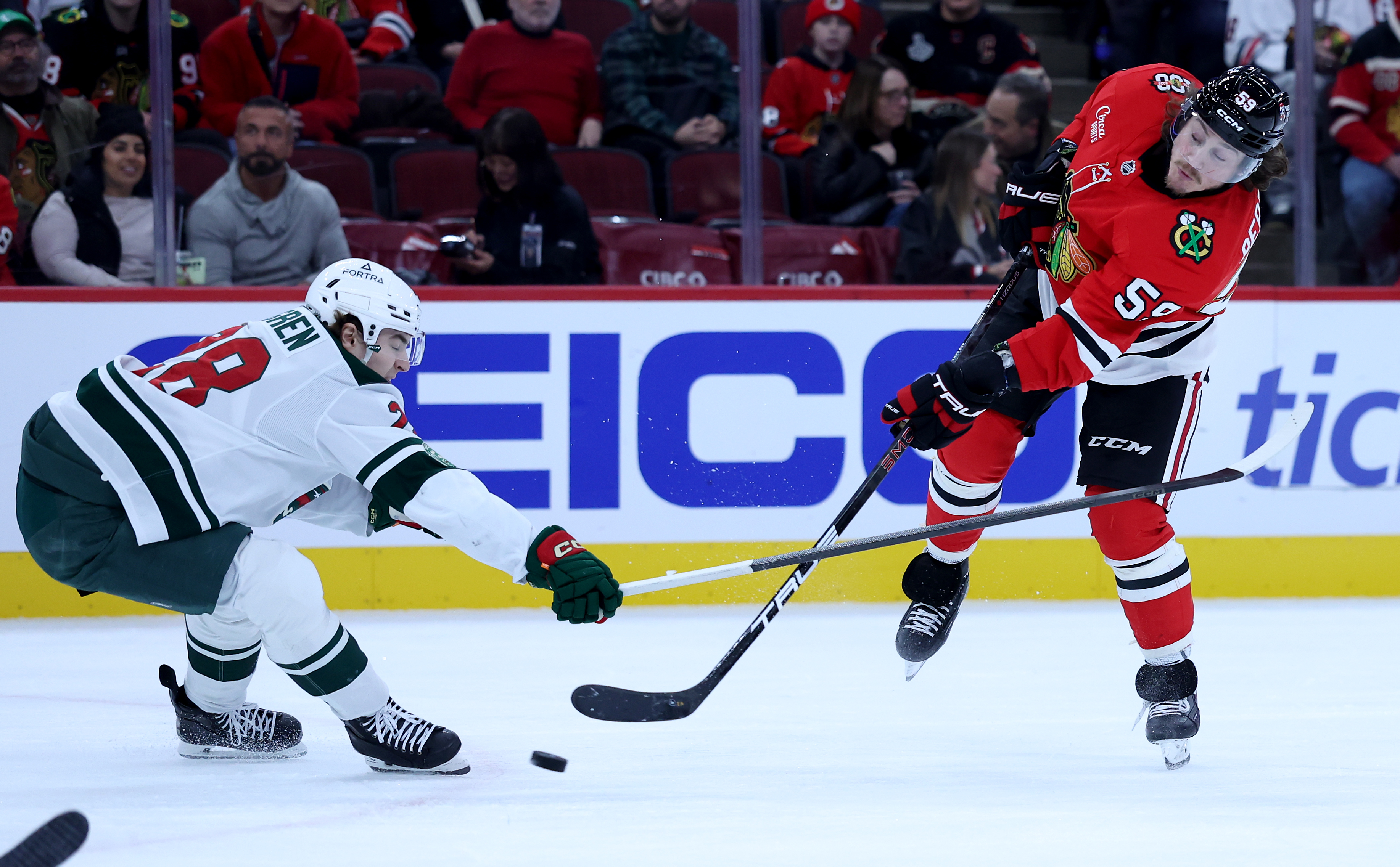 Chicago Blackhawks left wing Tyler Bertuzzi (59) takes a shot in the first period of a game against the Minnesota Wild at the United Center in Chicago on Nov. 26, 2025. (Chris Sweda/Chicago Tribune)