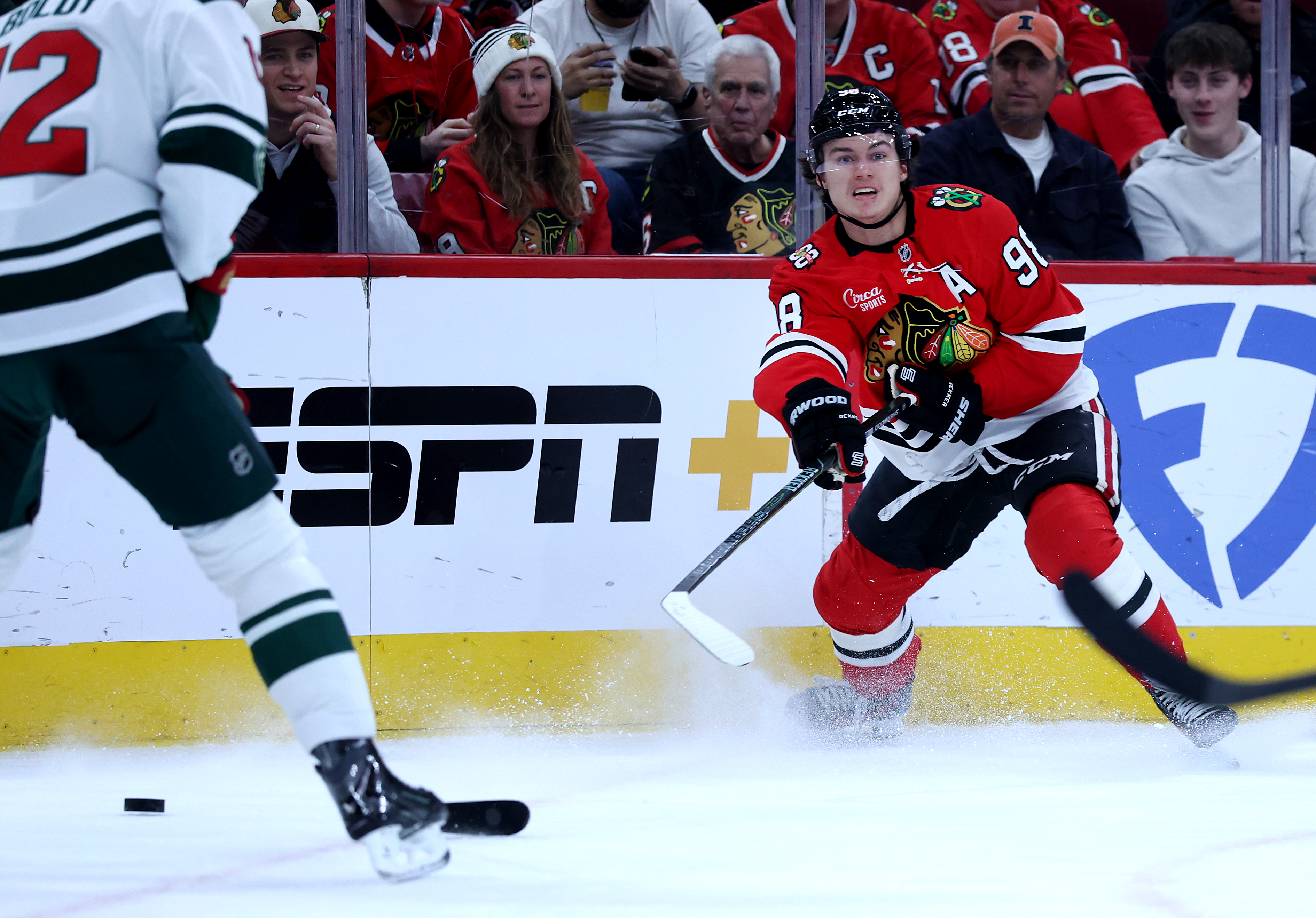 Chicago Blackhawks center Connor Bedard (98) makes a pass in the first period of a game against the Minnesota Wild at the United Center in Chicago on Nov. 26, 2025. (Chris Sweda/Chicago Tribune)
