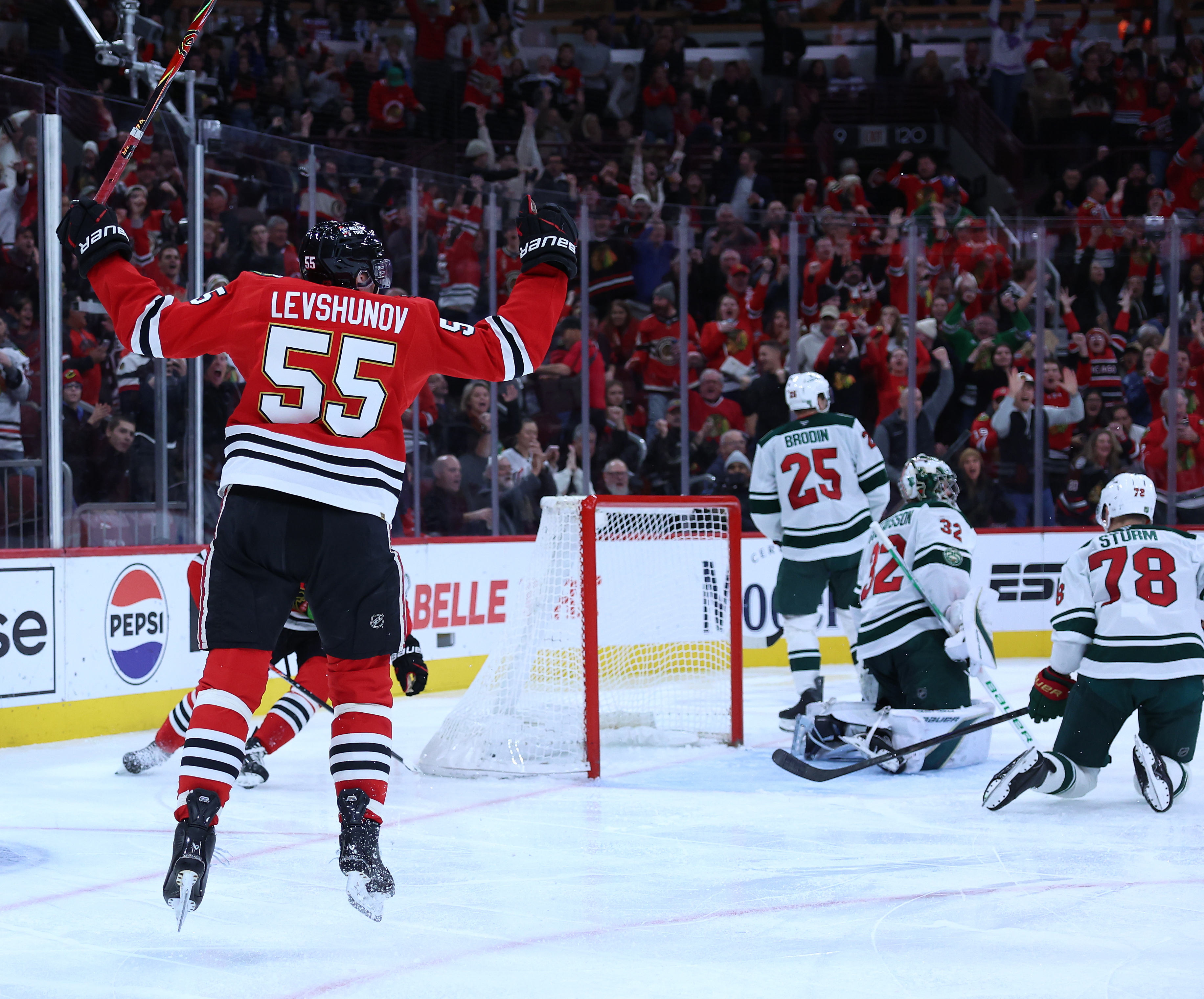 Chicago Blackhawks defenseman Artyom Levshunov (55) celebrates after scoring a goal in the third period of a game against the Minnesota Wild at the United Center in Chicago on Nov. 26, 2025. (Chris Sweda/Chicago Tribune)