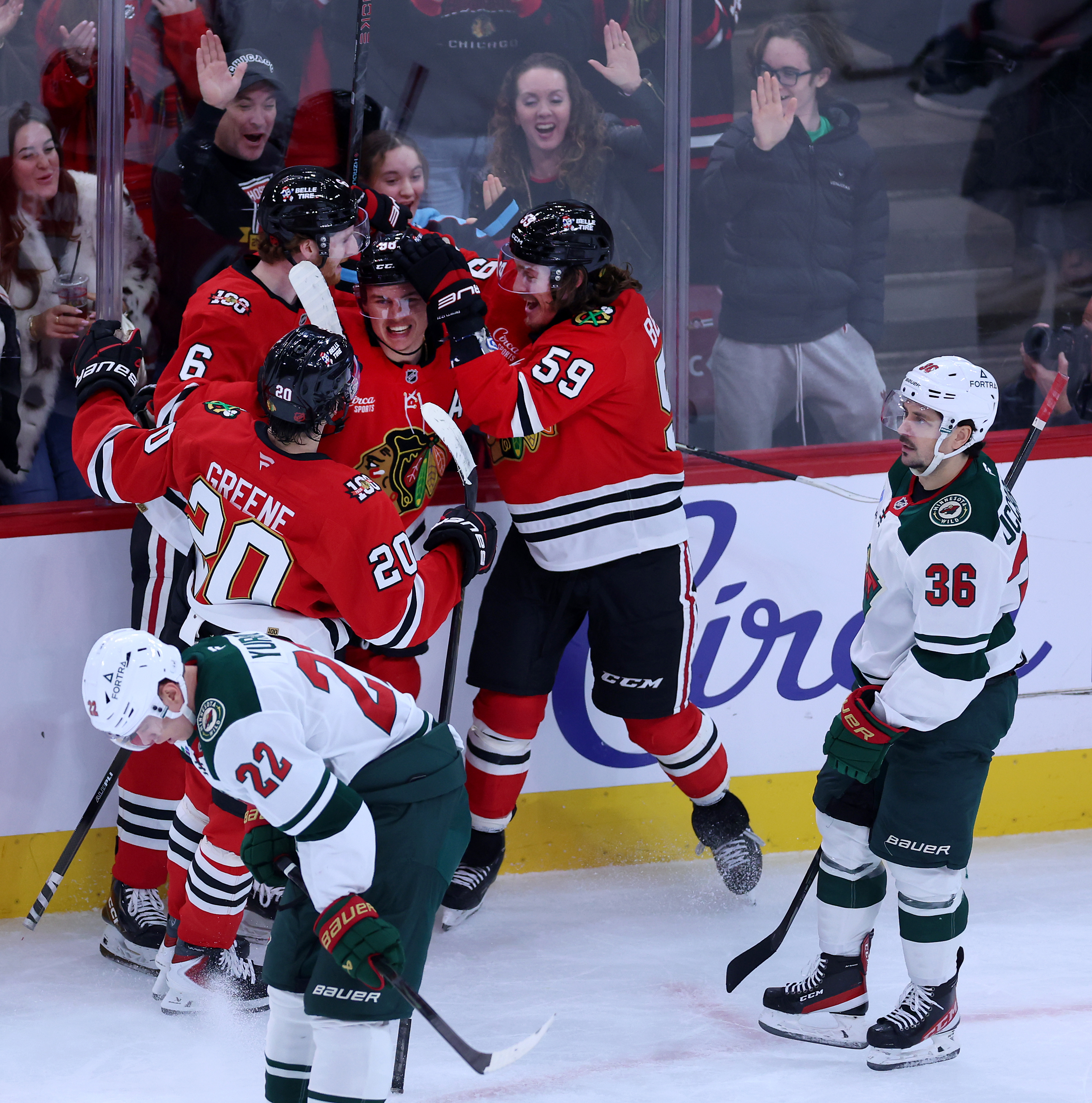 Chicago Blackhawks center Connor Bedard (center) celebrates with his teammates after scoring a goal in the second period of a game against the Minnesota Wild at the United Center in Chicago on Nov. 26, 2025. (Chris Sweda/Chicago Tribune)