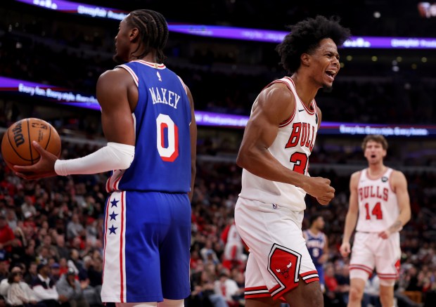 Chicago Bulls forward/guard Isaac Okoro (35) celebrates after scoring off a steal in the first half of a game against the Philadelphia 76ers at the United Center in Chicago on Nov. 4, 2025. (Chris Sweda/Chicago Tribune)