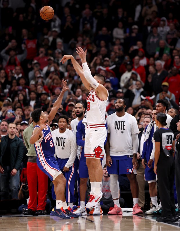 Chicago Bulls center Nikola Vučević (9) drains a game-winning 3-pointer in the second half of a game against the Philadelphia 76ers at the United Center in Chicago on Nov. 4, 2025. (Chris Sweda/Chicago Tribune)