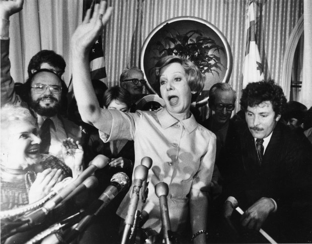 Surprised and exuberant, Jane Byrne and supporters, along with her campaign manager Don Rose (in glasses) on left, exult in her upset victory against Mayor Michael Bilandic on Feb. 27, 1979, in the Democratic mayoral primary in Chicago. (Anne Cusack/Chicago Tribune)