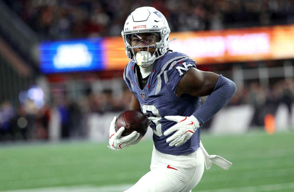 Stefon Diggs #8 of the New England Patriots runs the ball during the first quarter.
