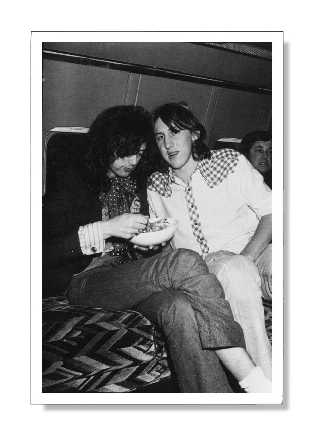  Led Zeppelin's Jimmy Page, left, and Cameron Crowe share an airborne moment during one of the band's tours in the mid-1970s. (Courtesy Cameron Crowe)