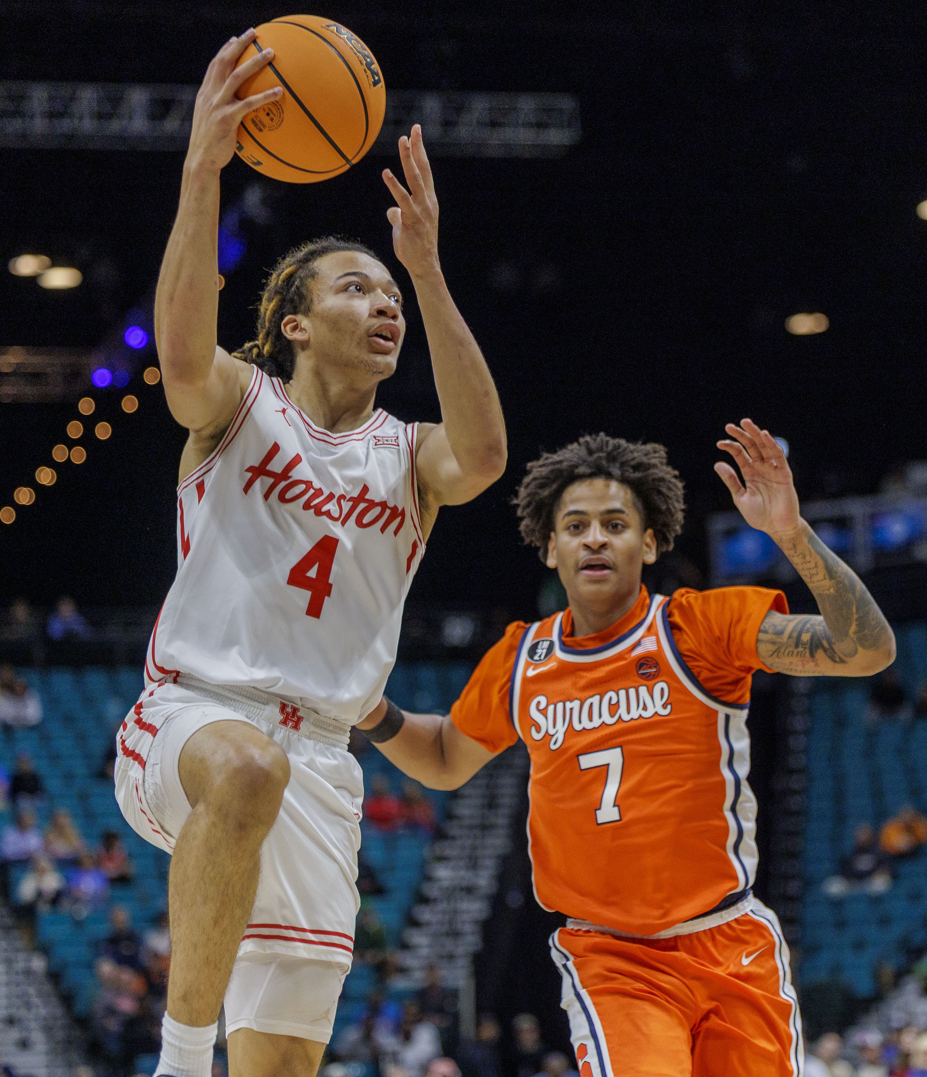 Houston Cougars guard Kingston Flemings (4) goes up for shot against Syracuse Orange forward Kiyan Anthony (7) as Syracuse takes on Houston in the first round of play in the Players Era Festival at the MGM Grand in Las Vegas Monday, November 24, 2025. (N. Scott Trimble | strimble@syracuse.com)