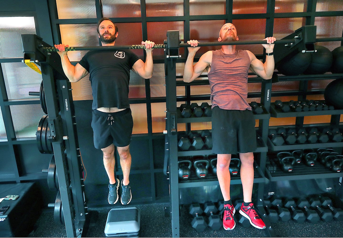 Adam Sandel (left) and Ron Cooper during their weekly "pull-up workout to end all pull-up workouts."