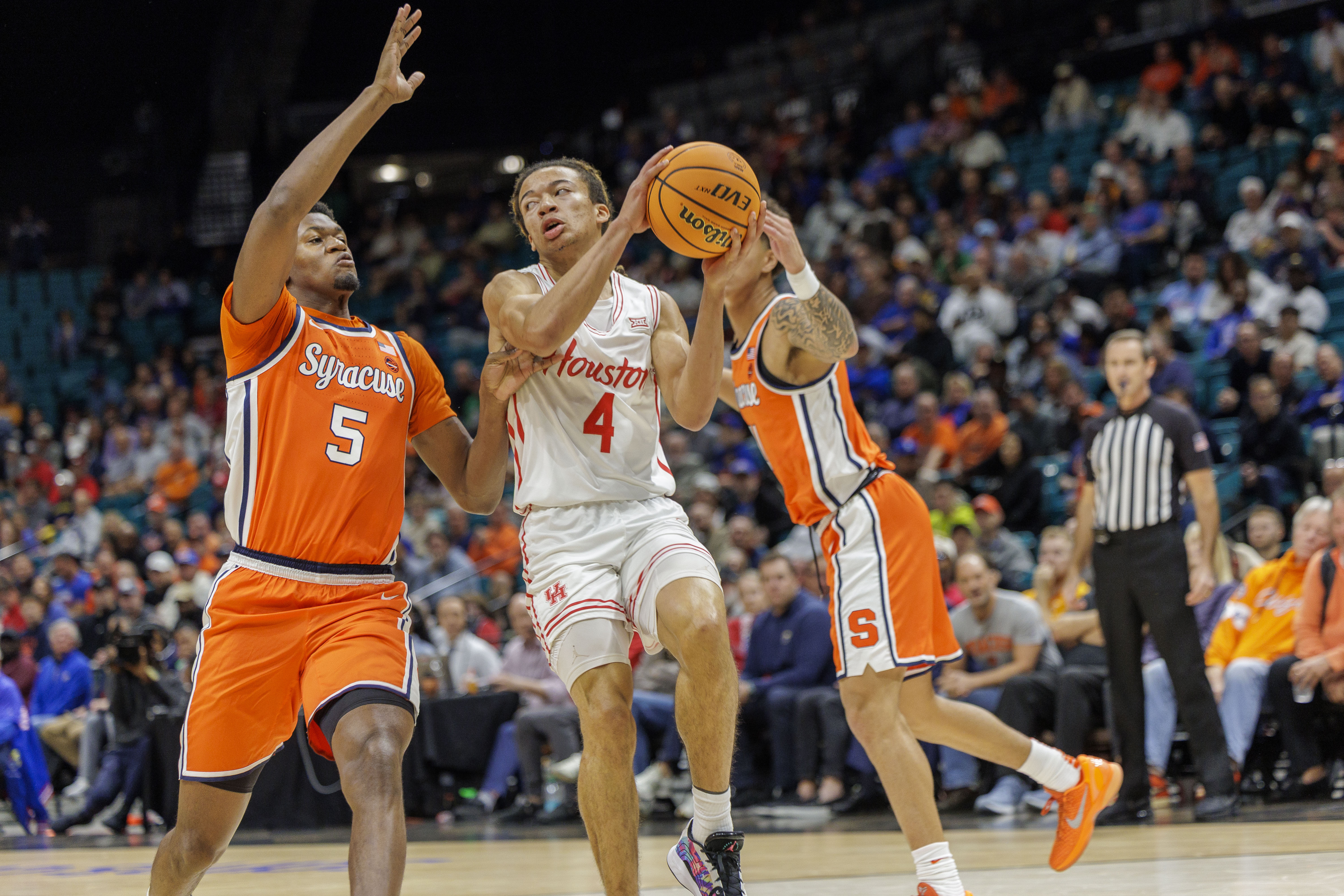 Syracuse Orange forward Tyler Betsey (5) screens Houston Cougars guard Kingston Flemings (4) as Syracuse takes on Houston in the first round of play in the Players Era Festival at the MGM Grand in Las Vegas Monday, November 24, 2025. (N. Scott Trimble | strimble@syracuse.com)
