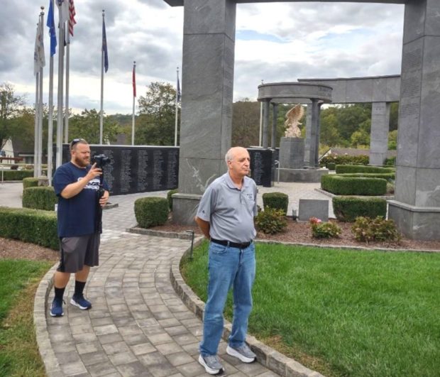 Art Swanlund films Air Force veteran Ralph Galati looking out at the Delaware County Veterans Memorial on West Chester Pike in Newtown Square. Galati was among the very first Delaware County Freedom Medal recipients in 2014. (COURTESY OF AMERICAN VETERANS MEDIA)
