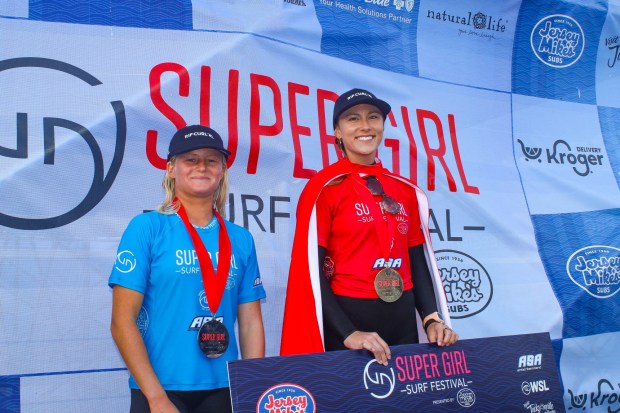 Encinitas surfer Alyssa Spencer won the Surfer Girl Surf Pro in Jacksonville, Fla. It was her third time donning the Surfer Girl cape. (Andrew Nichols)