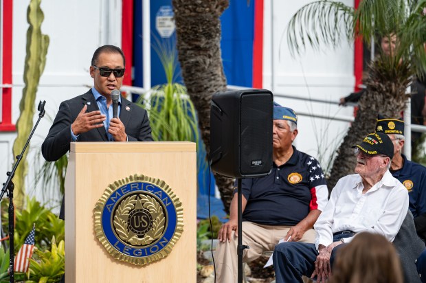 Carlsbad City Council member Kevin Shin speaks at the Veterans...