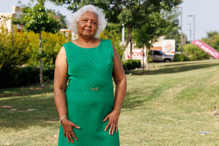 Feed Oak Cliff founder Anga Sanders pictured near a fast-food restaurant in Oak Cliff,...
