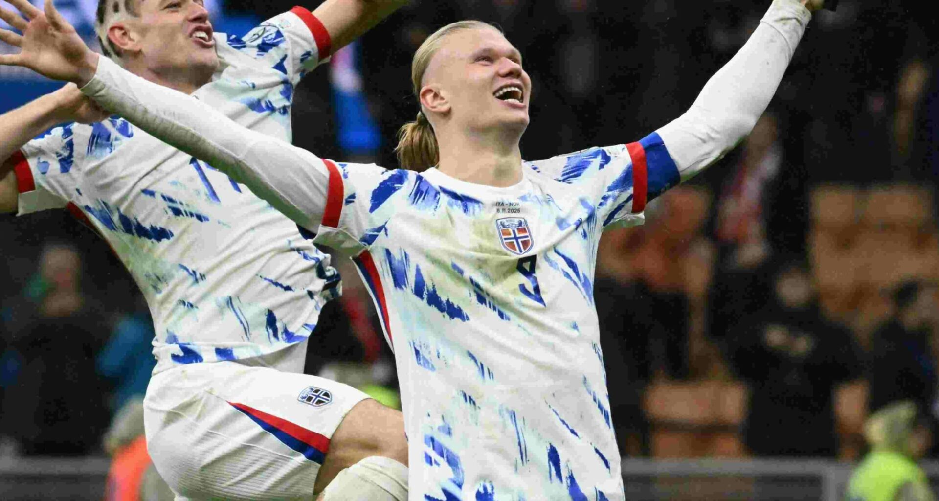 Erling Haaland celebrates after scoring against Italy