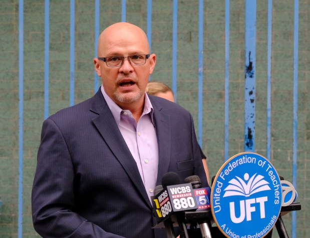 Michael Mulgrew, president of the United Federation of Teachers union, speaks to the media after visit to P.S. 15 on the Lower East Side on Sept. 29, 2020.