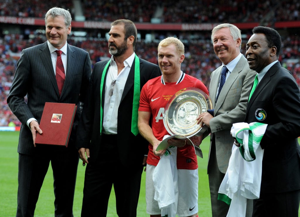 Former Manchester United chief executive David Gill, former New York Cosmos manager Eric Cantona, Paul Scholes, former Manchester United manager Sir Alex Ferguson and Pele pose together prior to Paul Scholes’ testimonial match between Manchester United and New York Cosmos at Old Trafford in 2011 in Manchester, England.