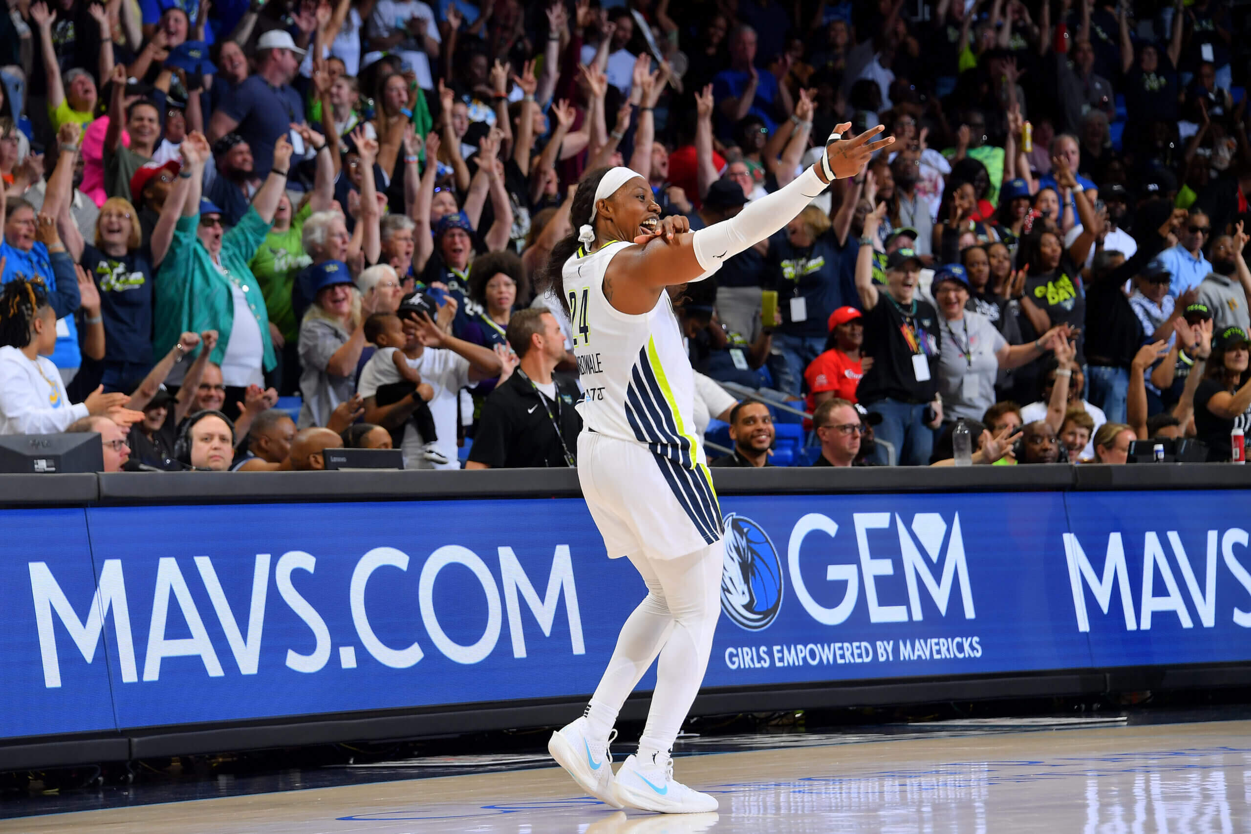 Arike Ogunbowale celebrates a play for the Dallas Wings.