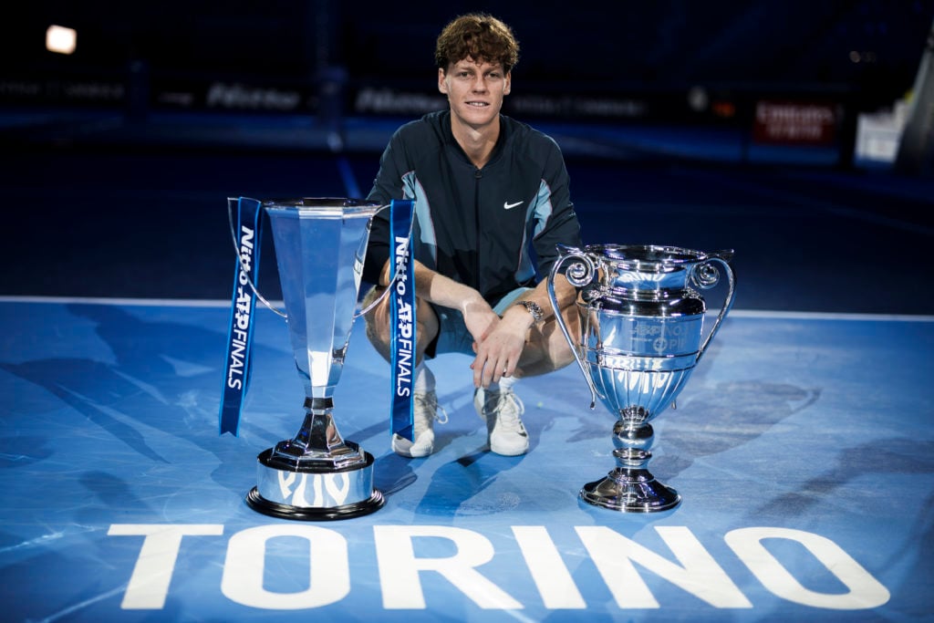 Jannik Sinner of Italy poses with the ATP Finals singles