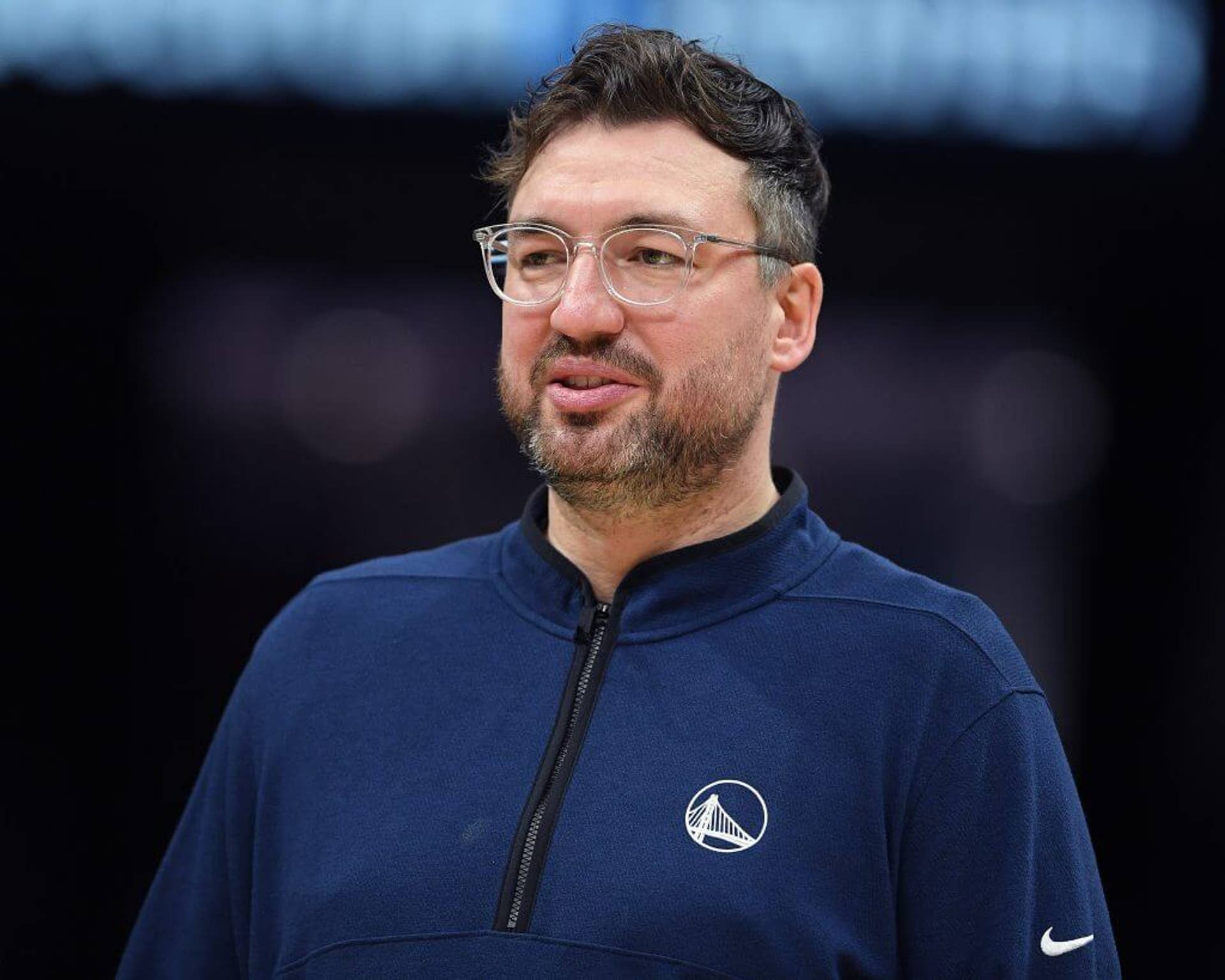 Assistant coach Chris DeMarco of the Golden State Warriors looks on during the game against the Charlotte Hornets on March 3 at Spectrum Center in Charlotte, N.C.