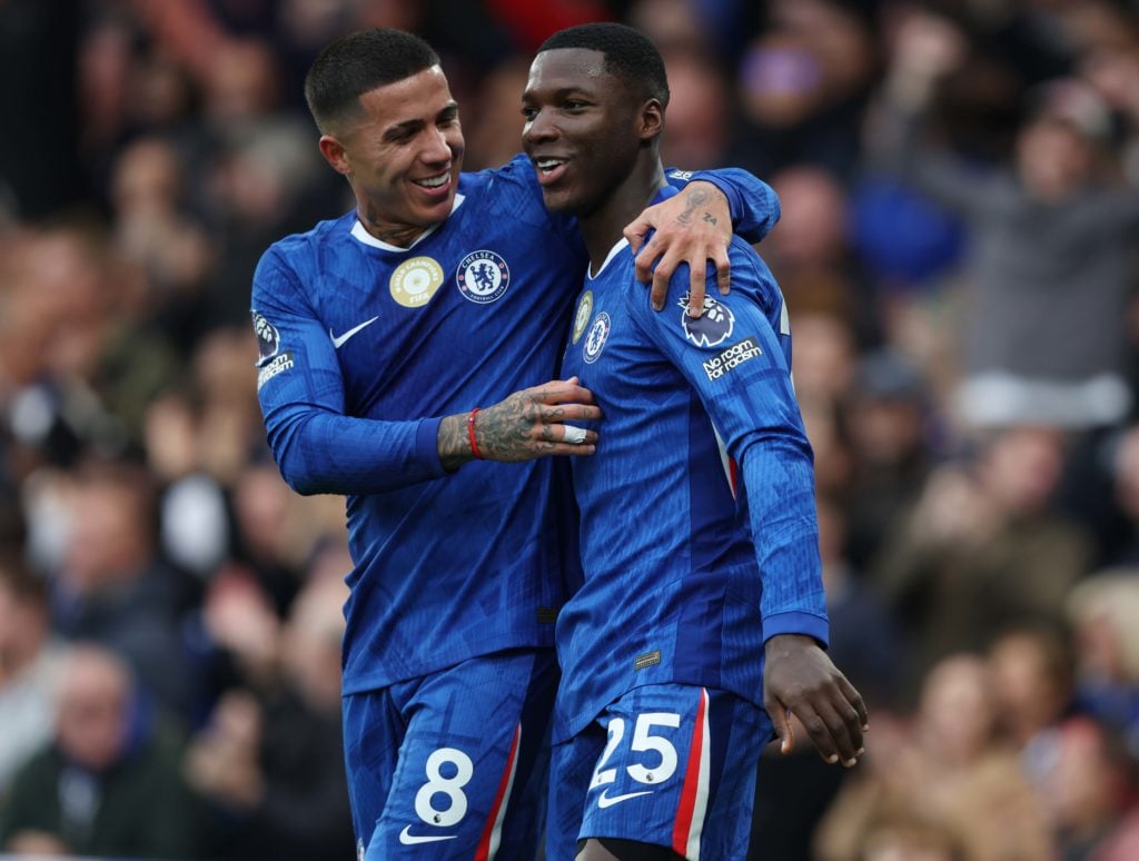 Moises Caicedo celebrates with Chelsea teammate Enzo Fernandez after scoring against Liverpool in the Premier League.