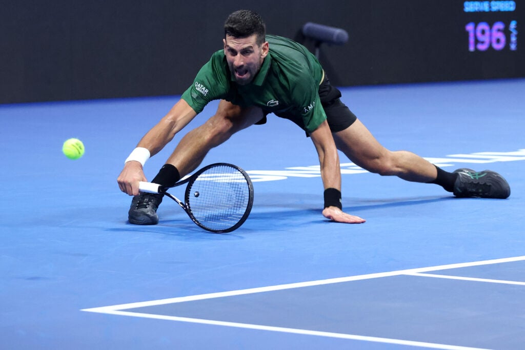 Novak Djokovic stretches for the ball against Nuno Borges at the 2025 Hellenic Championship