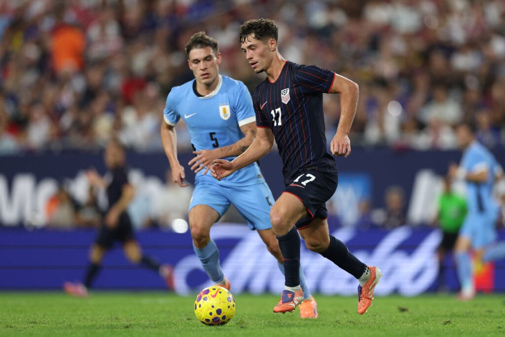Sebastian Berhalter #17 of United States controls the ball whilst under pressure from Manuel Ugarte #5 of Uruguay during the International Friendly match between United States and Uruguay at Raymond James Stadium on November 18, 2025