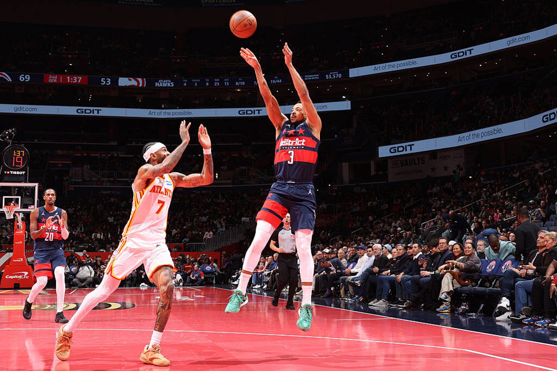 CJ McCollum attempts a jump shot over Nickeil Alexander-Walker on Tuesday.