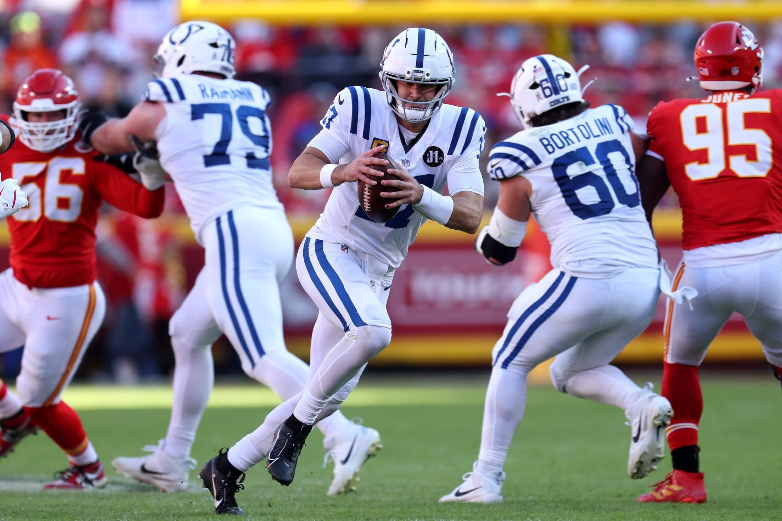 Daniel Jones #17 of the Indianapolis Colts rushes with the ball in the third quarter of the game against the Kansas City Chiefs at Arrowhead Stadium on November 23, 2025 in Kansas City, Missouri.