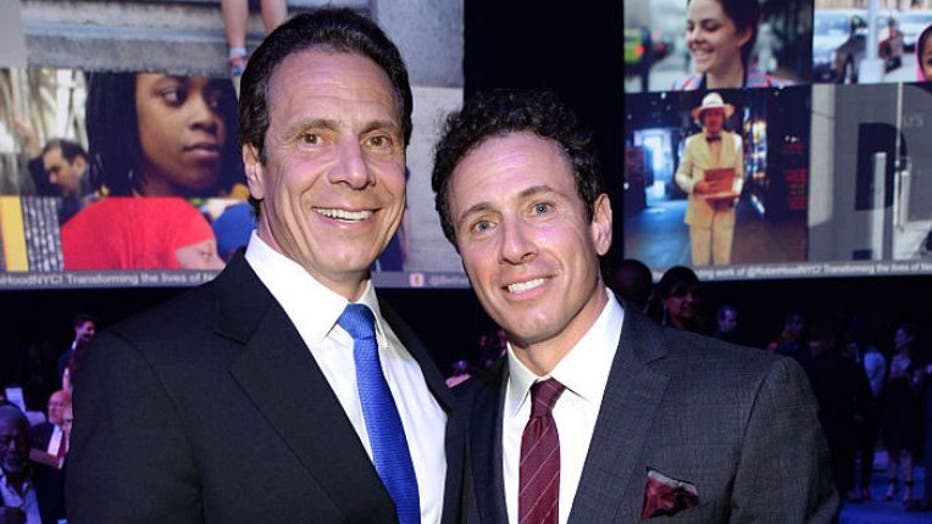NEW YORK, NY - MAY 12: New York Governor Andrew Cuomo and Chris Cuomo attend The Robin Hood Foundation's 2015 Benefit at Jacob Javitz Center on May 12, 2015 in New York City.