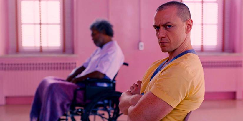 Mr. Glass (Samuel L. Jackson) and the Beast (James McAvoy) sit in a pink room in Glass