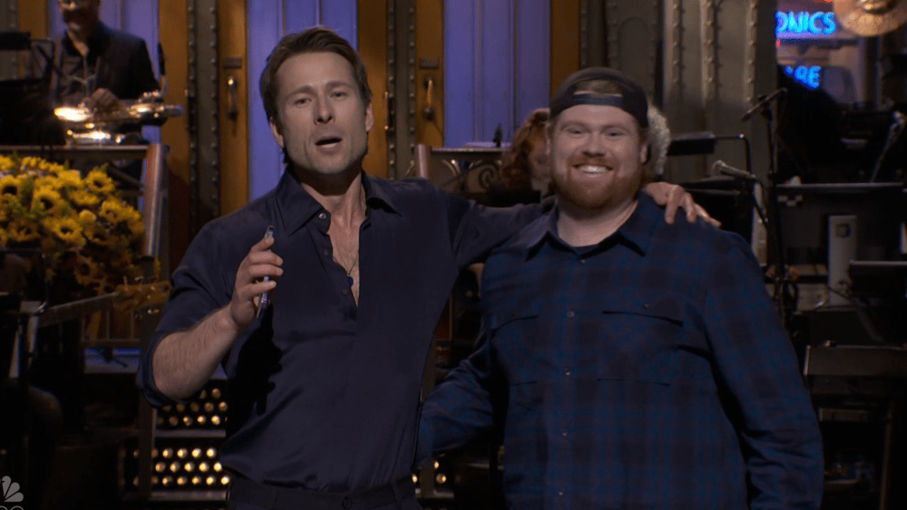 Glen Powell Brings His UPS Driver to Crash 'SNL' Monologue