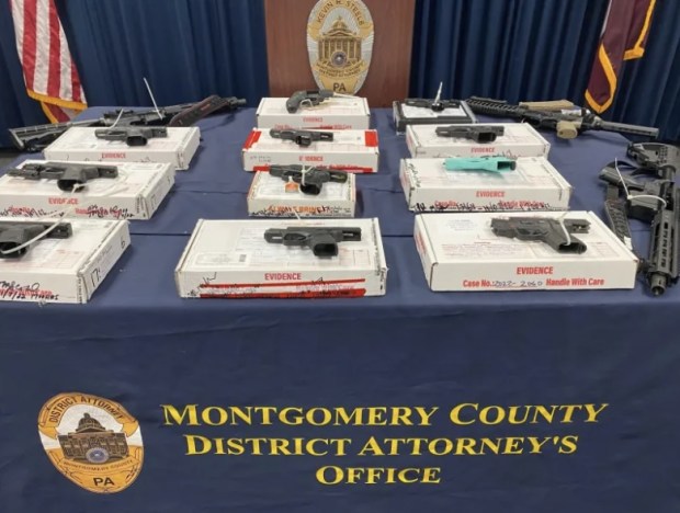 During a Feb. 22, 2023, news conference in Montgomery County, authorities displayed the guns linked to a gun trafficking network. (Photo by Carl Hessler Jr. - MediaNews Group)