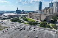 Aerial view of Dallas City Hall (right) and the Kay Bailey Hutchison Convention Center,...