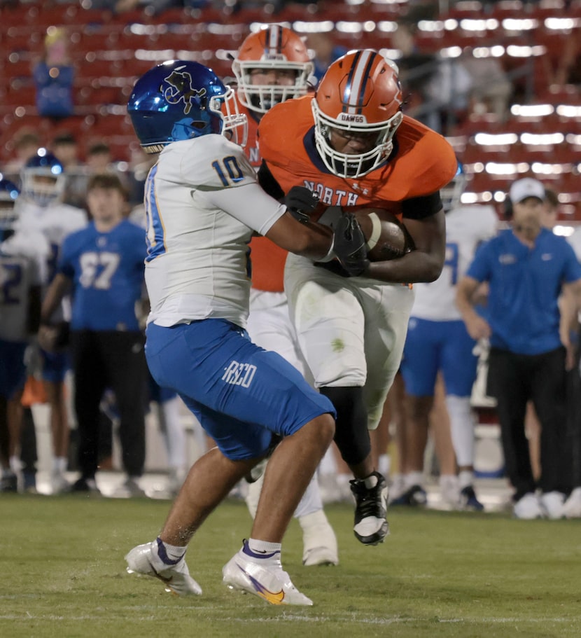 McKinney North running back Danny Forrester (4) rambles into the Frisco secondary as...