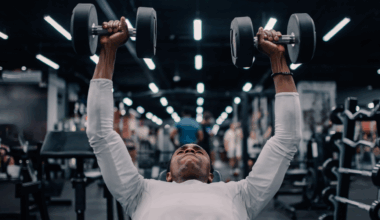 A man doing dumbbell chest press