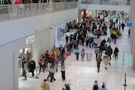 Shoppers browse through stores at Mall of America for Black Friday deals, Friday, Nov. 28,...