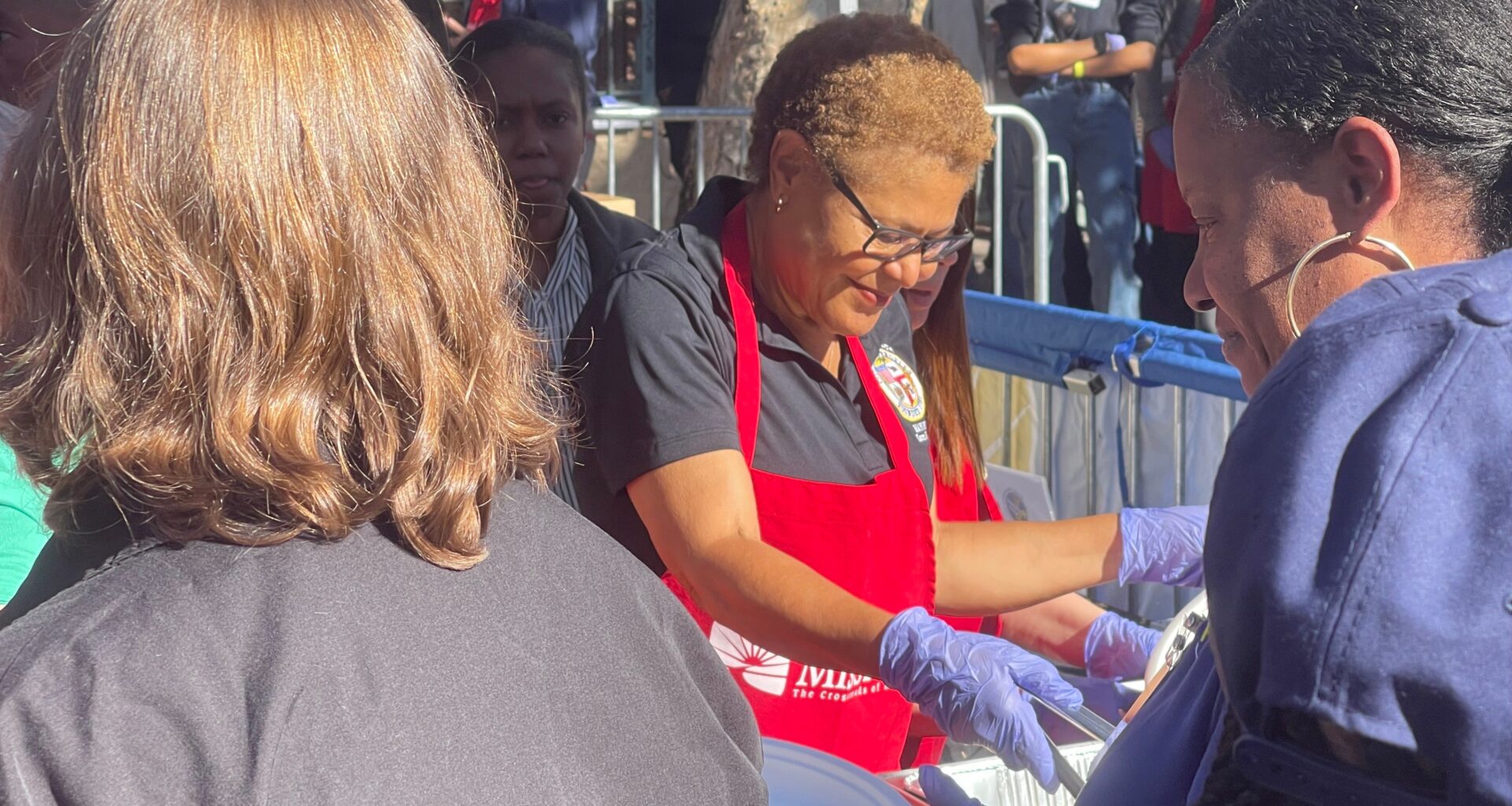 Mayor Karen Bass was among those helping to serve food on Skid Row on Wednesday.