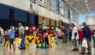 people walk around the great new york state model train fair