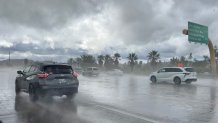 Heavy rain drenched drivers on Interstate 15, Sunday, falling from large clouds still heavy with moisture, November 16, 2025.