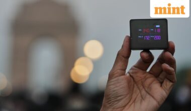 A protester shows the present AQI or Air Quality Index during a protest against what they called the government's lack of action to combat air pollution in the capital city New Delhi, India, Sunday, Nov. 9, 2025. (AP Photo/Manish Swarup)